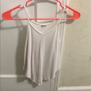 tan and white tank top